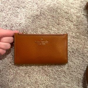 New condition Kate spade pebbled leather bifold wallet